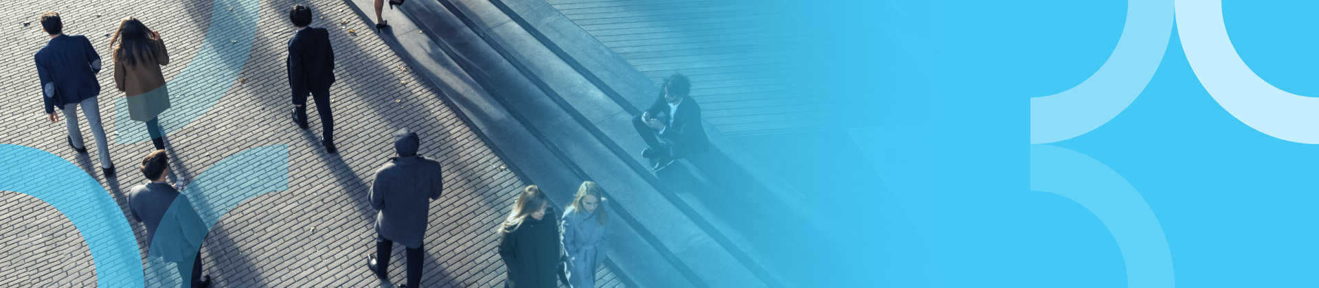 Blurred image of people walking in an office building going about their business. Work environment activity.