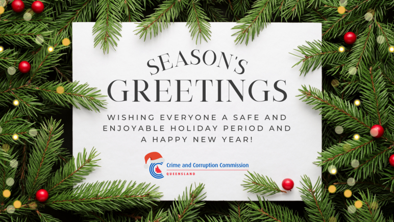 Branches of a Christmas tree frame a white card that reads, "Season's Greetings. Wishing everyone a safe and enjoyable holiday period and a happy new year!"