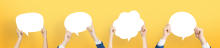Banner image of people holding up question marks 