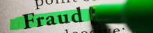 The word "Fraud" is highlighted in green on a printed page, emphasizing its importance. A highlighter tip is visible, conveying caution and alert.